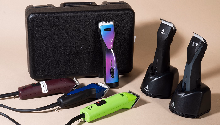 Various andis dog grooming clippers and case