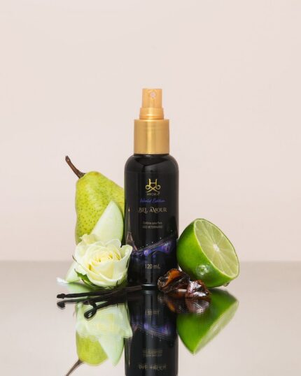 Hydra Bel Amour pet cologne with pear, green apple, white rose, lime, vanilla pods and amber on a reflective surface
